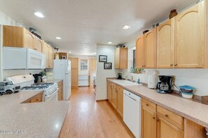 Kitchen with many essentials. 