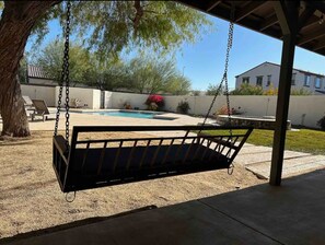 Swing under the eaves outside of the front door