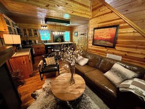 View of kitchen shows the open space designed to bring loved ones togeter.