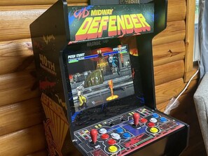 Mortal Kombat!  Located on the 2nd floor loft.  Just one of the 20 fun games on the new freeplay arcade game!  