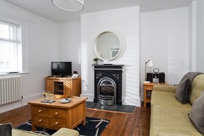 Sitting room with electric wood burning stove effect fire