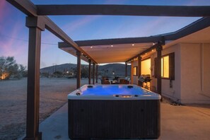 Jacuzzi at dusk on the patio. Clear view to stare up and get lost in the stars. 