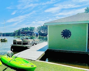 Learn to kayak or paddle board in the quiet main lake cove