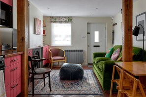 LIVING AREA Friends and guests alike comment on how much they like the unusual colour scheme.