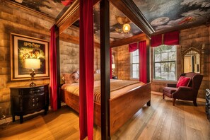 Fall asleep watching a quidditch match in this spectacular Harry Potter room with a king sized bed.