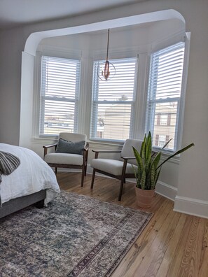 Master Bedroom windows with seating.