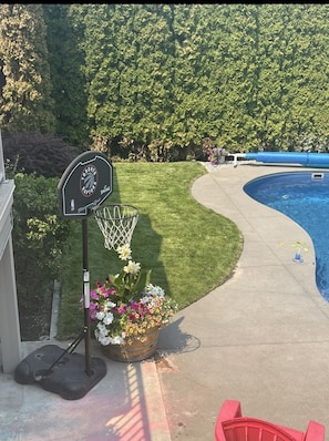 basketball net on backyard cement pad