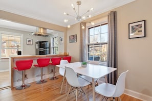 With the bar and the table, there's chairs for as many as 8 people to have dinner together at the same time!
