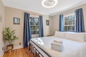 Fall asleep on this giant king bed with a luxury hybrid coil and memory foam mattress. Even if you had to take a red eye to get here, you can sleep in as late as you want when you pull the blackout curtains tight!