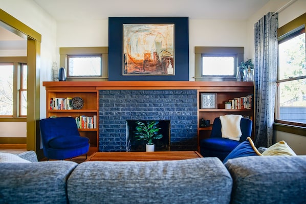 Chat, relax or play a board game in the charming main floor living room.
