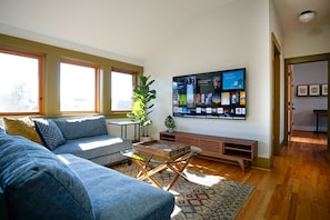 Watch a movie or show on the huge 65” Smart 4k TV in the cozy upstairs lounge.