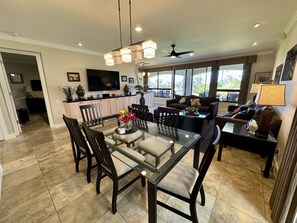 View from kitchen across dining area and great room towards the lanai