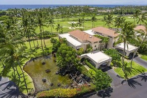 Villa One surrounded by lawns and pond