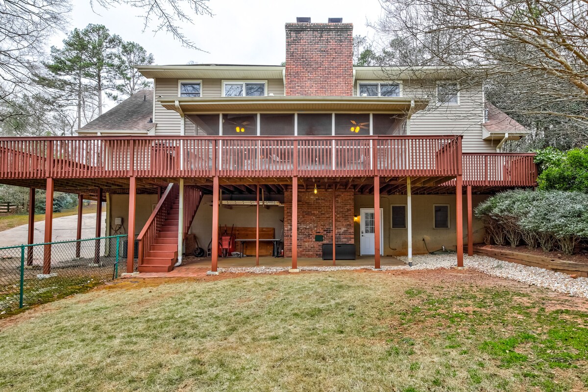 Incredible lakefront home with two-story dock, WiFi, & game room