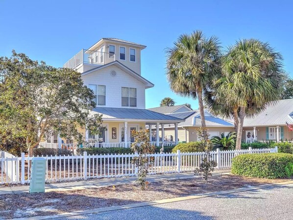 The View as you arrive!  Florida Palm trees frame the house as you approach for your idyllic beach oasis