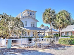 The View as you arrive!  Florida Palm trees frame the house as you approach for your idyllic beach oasis