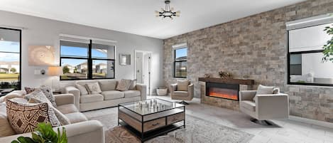 Stupendous and gorgeous family gathering, perfect blend of modern style with a Electric Fireplace emphasize comfort, functionality and practicality. The modern decoration has a sense of sophistication and elegance.