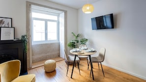 Dining area with TV #porto #downtown #sunny #airbnb