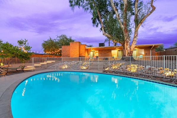 Large Pool with Landscape lighting to enjoy Nightime swims.