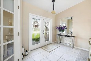 Entry of front door to living room. 