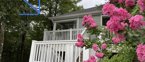 This is your condo, tucked up in the trees.  Corner unit with large bay windows.