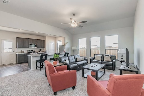 Living room and kitchen area conveniently close