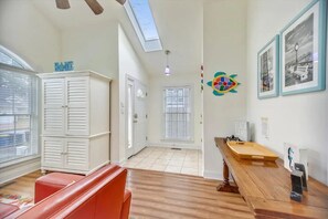 Entry foyer and front sunroom/sitting room