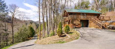 The paved driveway takes you to tranquil privacy and a flat parking area