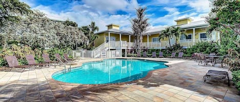 Lovely setting at the Beach Club heated pool.  Grab a provided beach towel and good book!