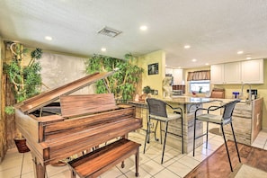 Living Area & Dining Area | Piano | 2-Person Breakfast Bar