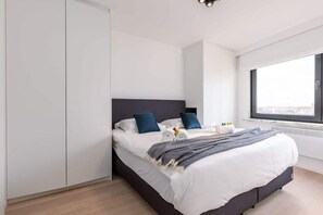 First double bedroom with ensuite bathroom (We provide prepared beds with high-quality bed linen)