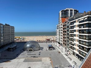 Great location - apartment building on the right side of the square with lateral sea view