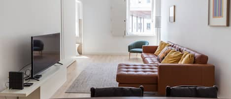 Bright living area with stylish sofa #airbnb #lisbon #airbnb #sunny #relax