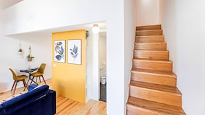 Overview of main area, bathroom and stairs up to the bedroom.