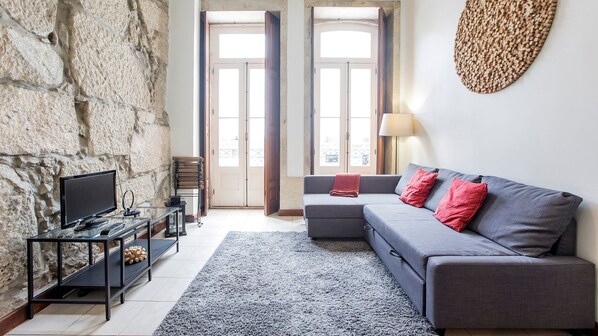 Living Area with big comfortable couch. #relax #Porto #airbnb