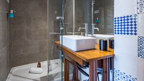 Bathroom with a shower, decored with a diversity of beautiful tiles #airbnb #lisbon #pt #portugal #bathroom