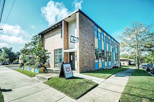 The main building with the coffee shop in the front. Great historic neighborhood.
