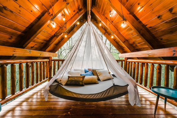 Tiipii swing and string lights on the upper deck...the best place to relax!