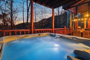 Hot Tub (new in 2022) sits 7 people.