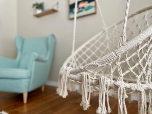 Enjoy a photo-op in the hanging chair.