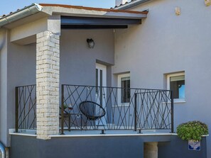 Building, Property, Plant, Flowerpot, Blue, Window, Houseplant, Architecture, Shade, Wood