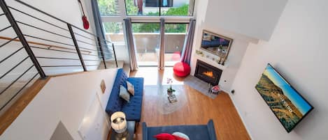 Bright large living room w patio views