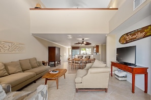 Living room with smart television~ Hawaii art and ample seating