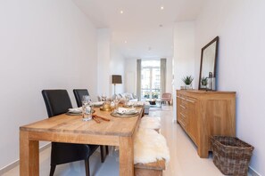 Spacious, inviting dining area with family dining table