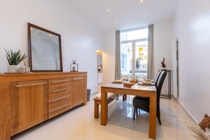 Spacious, inviting dining area with family dining table