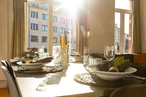 Sunny dining area with family dining table