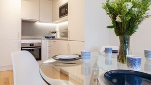 View of the dining area with a modern and simple kitchenette #airbnb #lisbon #portugal #pt #diningarea