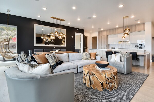 Sophisticated Living Room with Comfortable Seating and a 65… read more