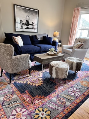 Relax in the "den," located in the back of the home, featuring a large screen TV