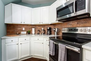 Kitchen is stocked with all the essentials like coffee and tea! 